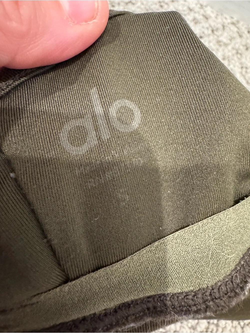 Alo Yoga Wild Thing Bra in dark olive green w/ ruched front V-neck design